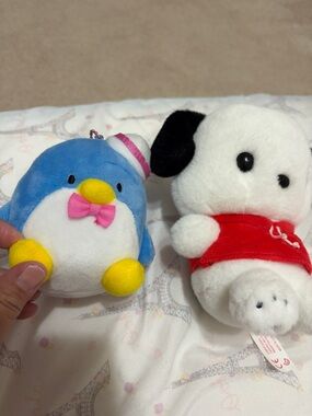 Tuxedo Sam and Pochacco plush